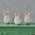 7.5" Resin Egg With Bowtie